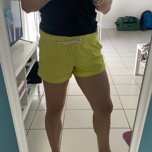 Yellow Lululemon play all day shorts size 4